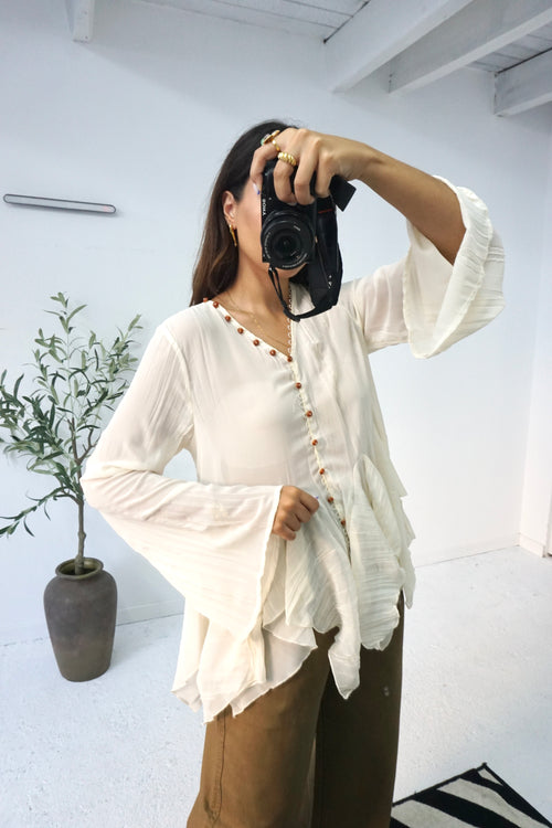 Blusa de folhos