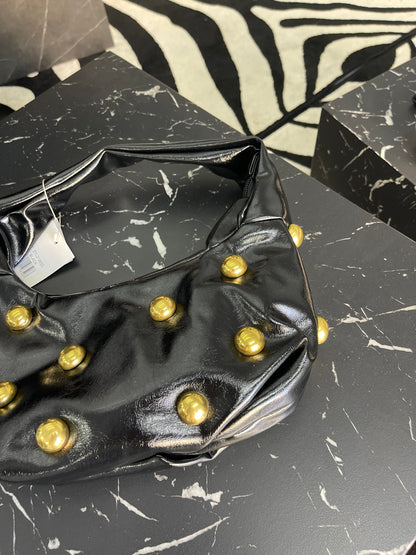 Mala Verniz de Tachas