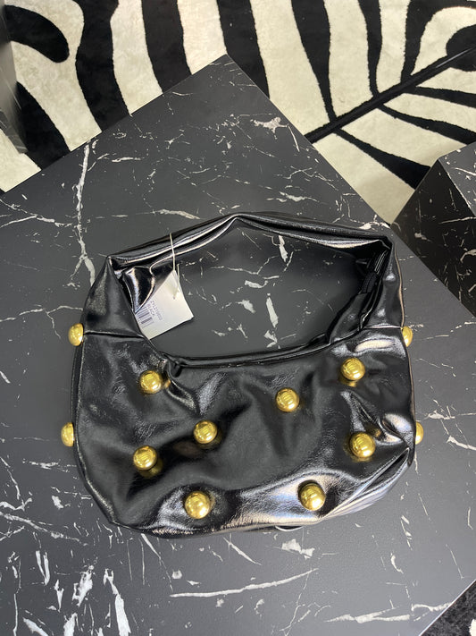 Mala Verniz de Tachas